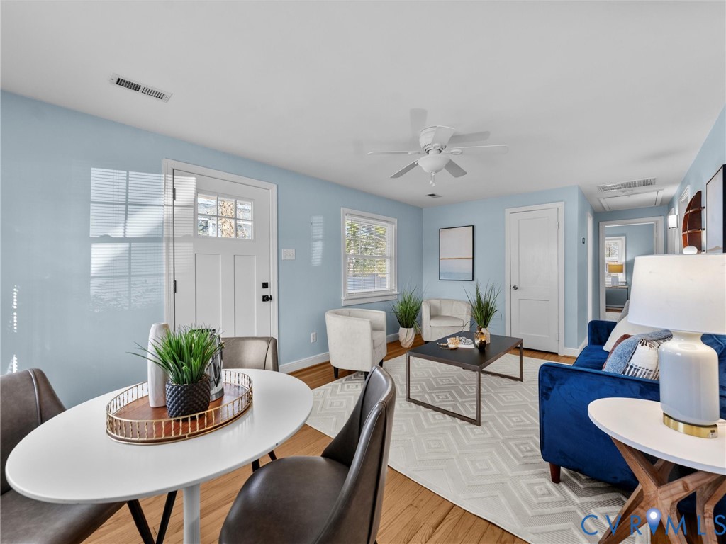 6715 Galaxie Road Henrico, VA 23228 - Photo 4 of 40 a living room with furniture potted plant and a window