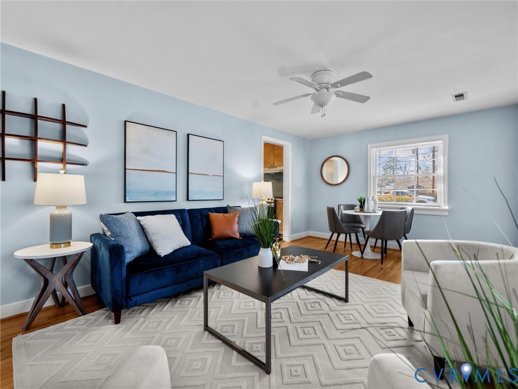6715 Galaxie Road Henrico, VA 23228 - Photo 5 of 40 a living room with furniture and a table
