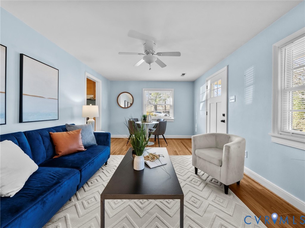 6715 Galaxie Road Henrico, VA 23228 - Photo 8 of 40 a living room with furniture and a large window