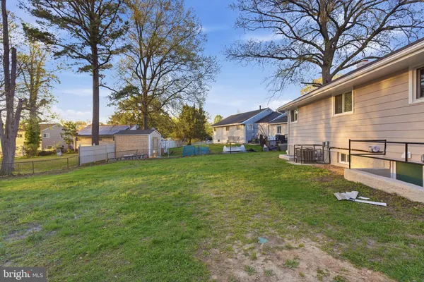 a view of backyard with green space