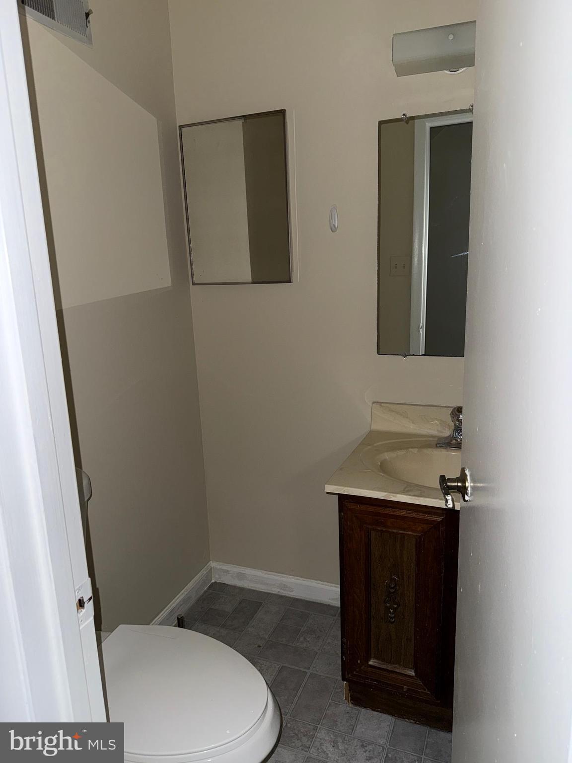 9 Autumn Hill Way Gaithersburg, MD 20877 - Photo 2 of 2 a bathroom with a toilet and a sink