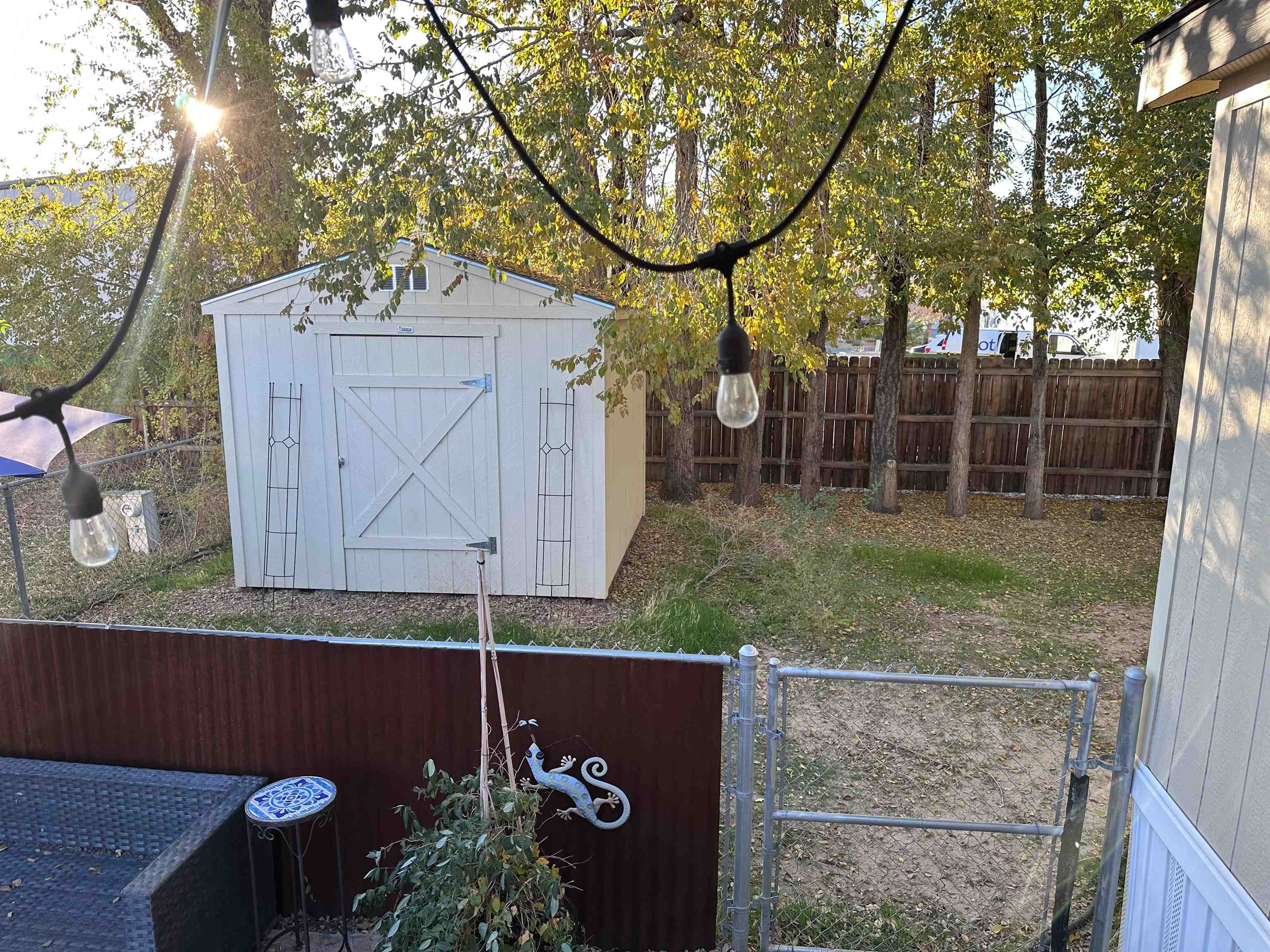 585-25 25 1/2 Road, Unit 125 Grand Junction, CO 81505 - Photo 3 of 24 a backyard of a house with lots of green space