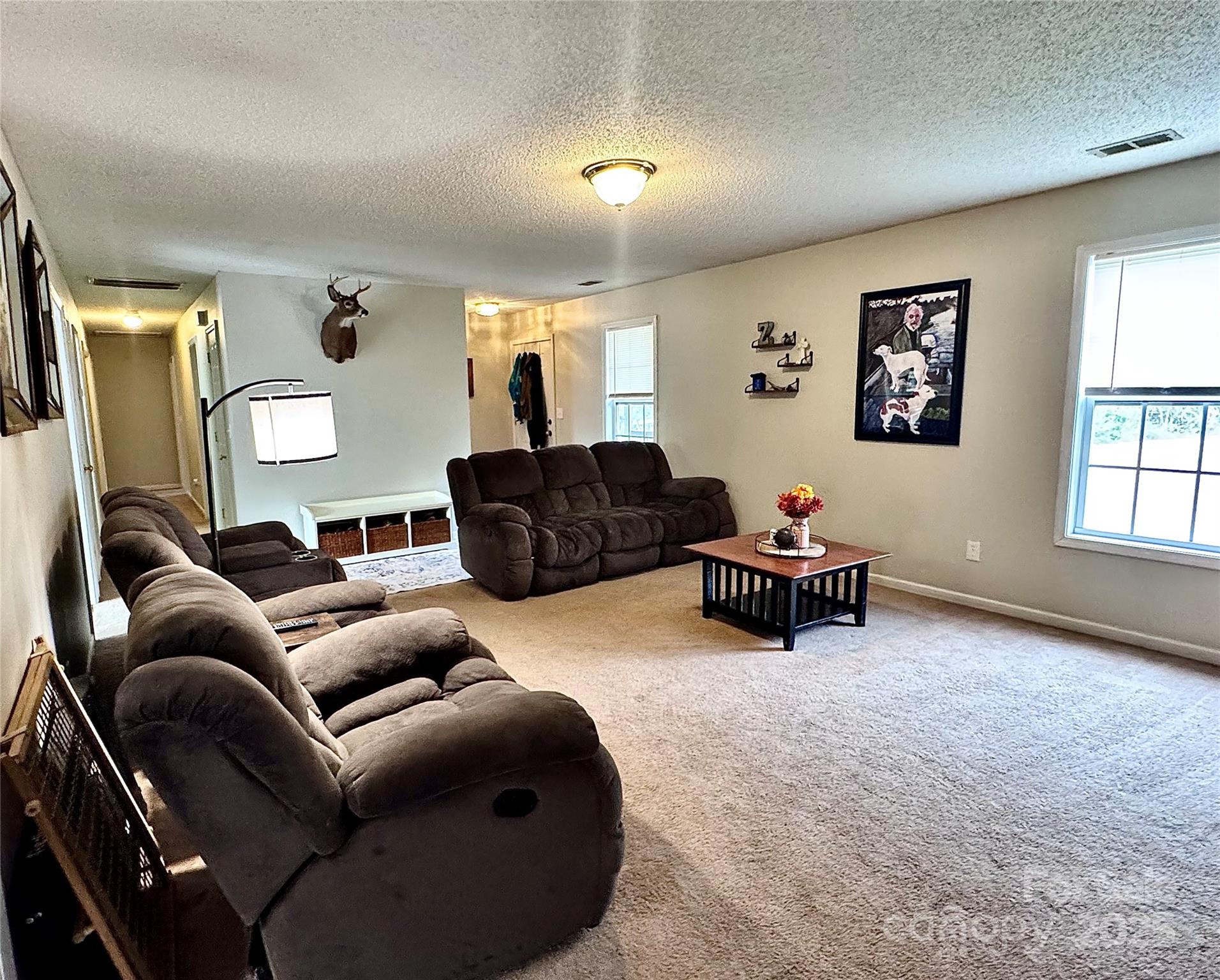 1723 Faulks Church Road Marshville, NC 28103 - Photo 25 of 27 a living room with furniture and a window