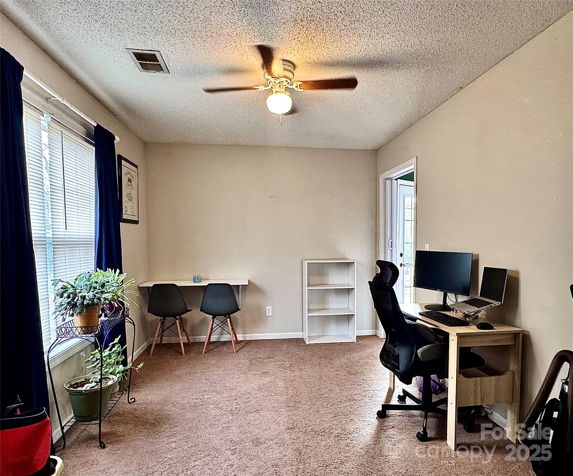 1723 Faulks Church Road Marshville, NC 28103 - Photo 27 of 27 a workspace with furniture and a window