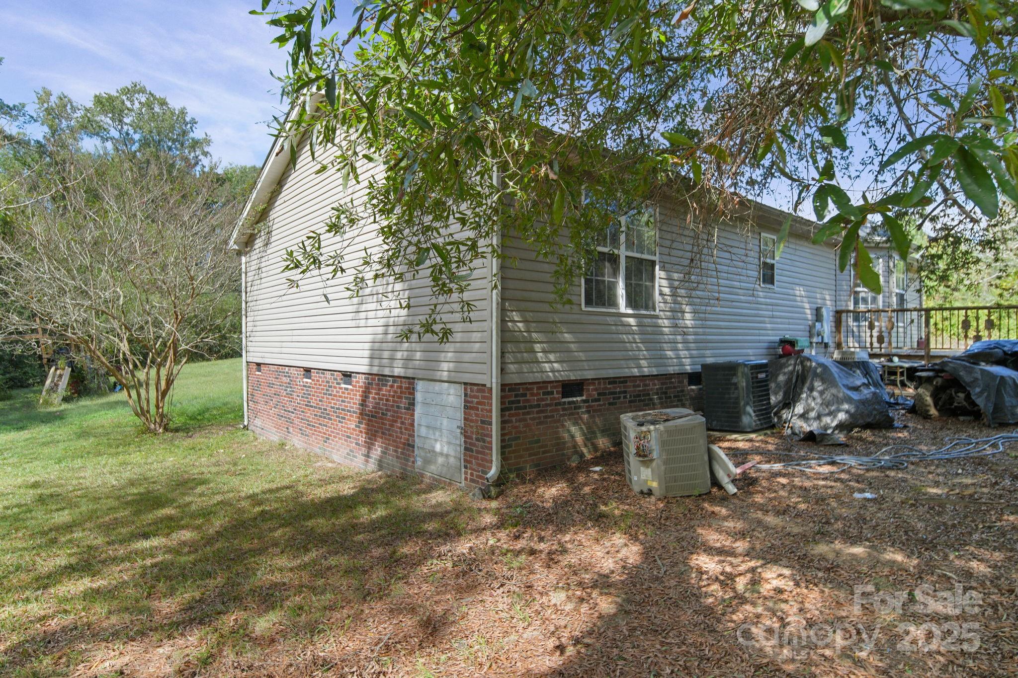 1723 Faulks Church Road Marshville, NC 28103 - Photo 5 of 27 a view of a house with backyard