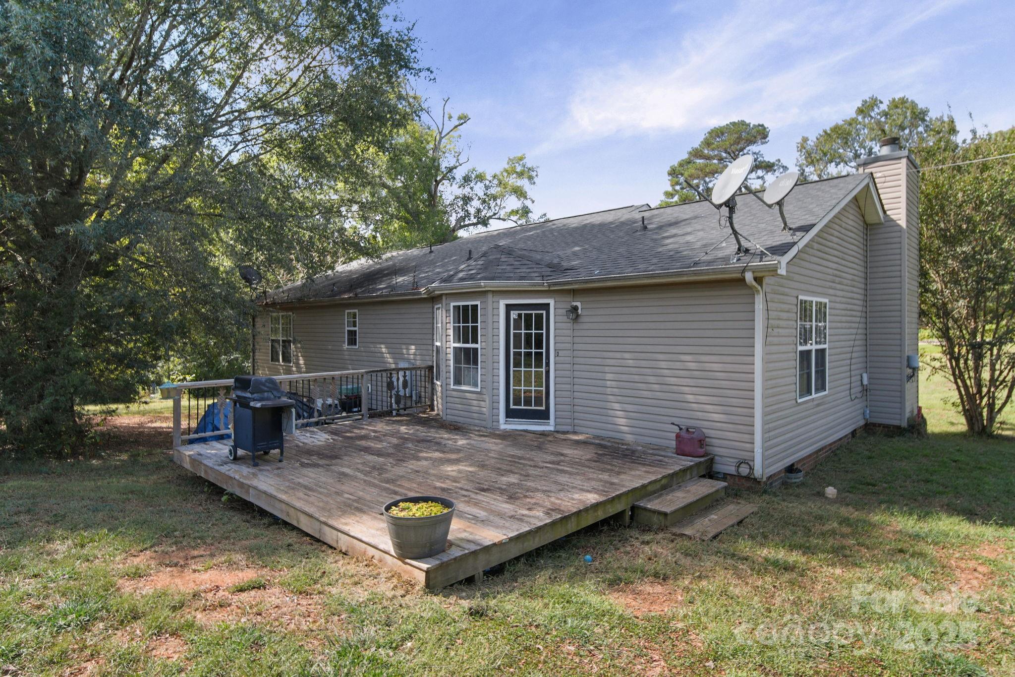 1723 Faulks Church Road Marshville, NC 28103 - Photo 8 of 27 a view of a house with a yard