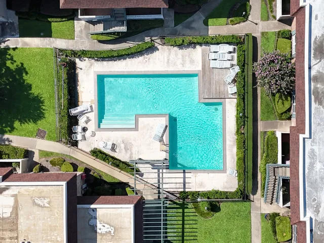 an aerial view of a city with lots of residential buildings