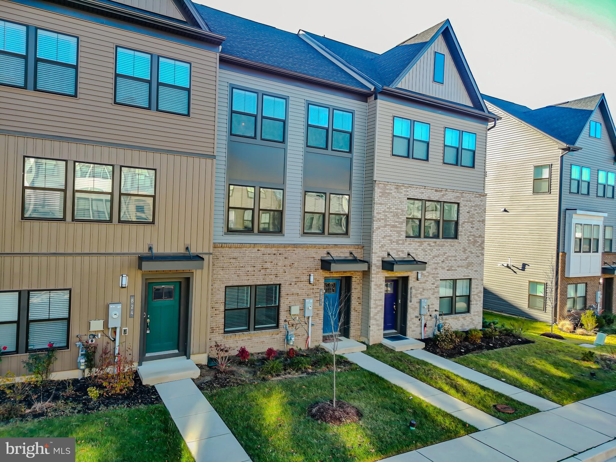 822 Teacher MItchell Road Glen Burnie, MD 21060 - Photo 3 of 53 a front view of a house with a yard