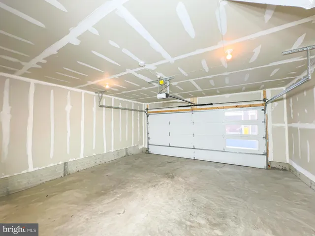 a front view of residential houses with street