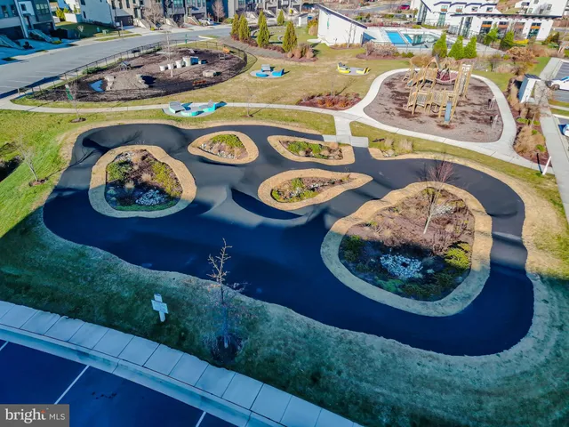 an aerial view of a house with swimming pool