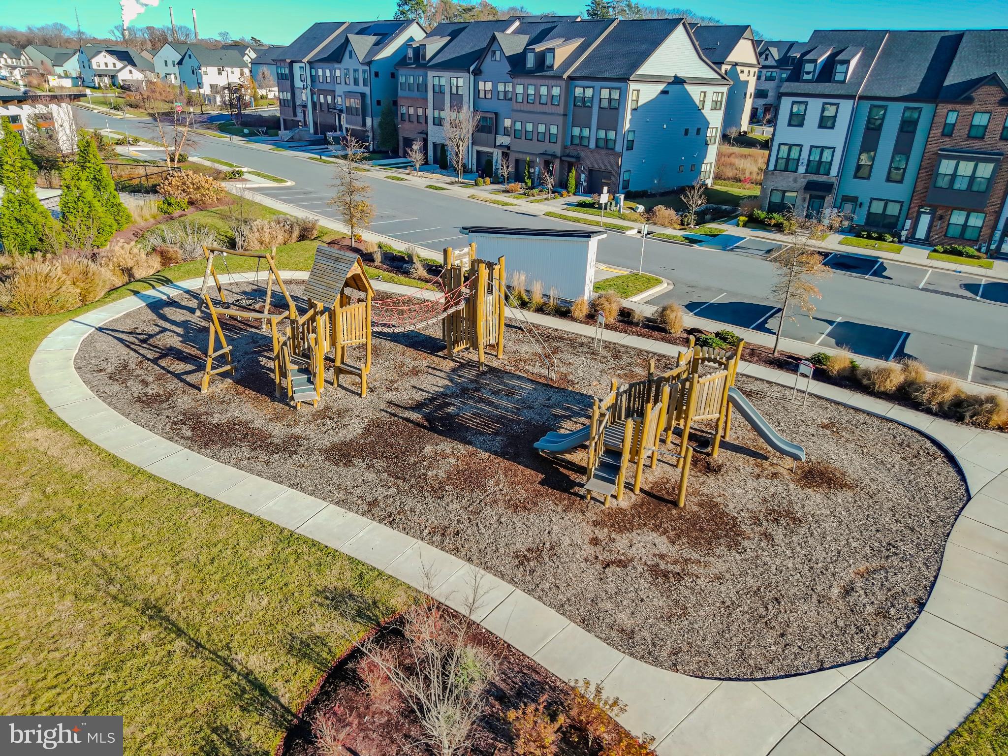 822 Teacher MItchell Road Glen Burnie, MD 21060 - Photo 47 of 53 a view of a swimming pool with a patio