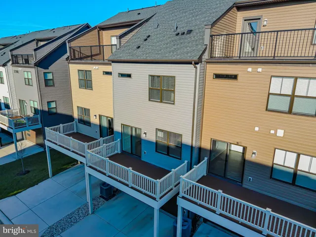a view of a balcony with wooden floor