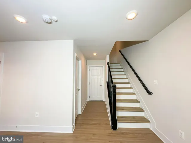 a view of entryway with wooden floor