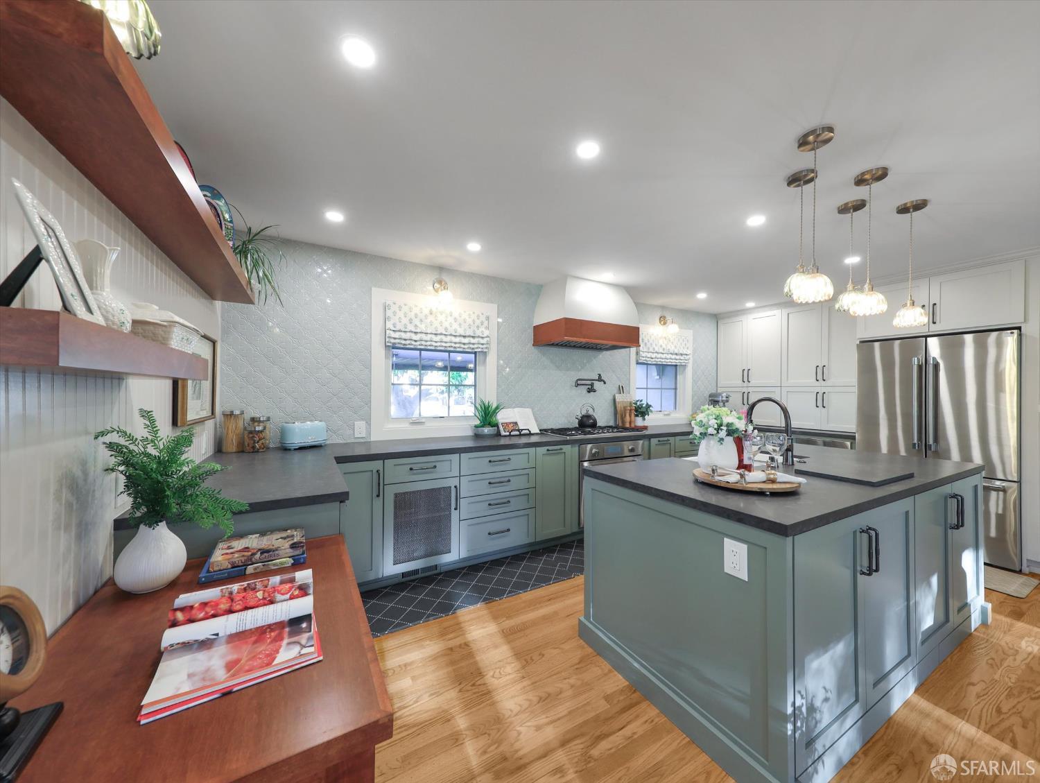 1773 Pinetree Court Concord, CA 94521 - Photo 13 of 37 a kitchen with kitchen island granite countertop a sink and stove