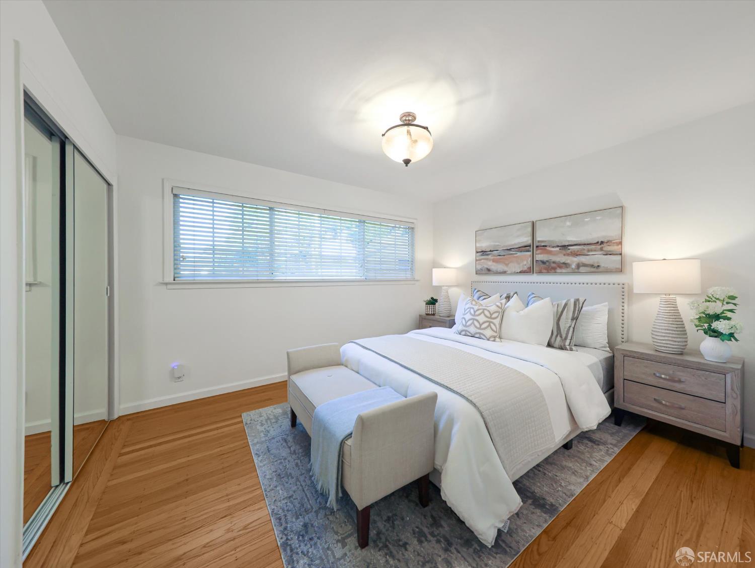 1773 Pinetree Court Concord, CA 94521 - Photo 15 of 37 a bedroom with a bed and wooden floor