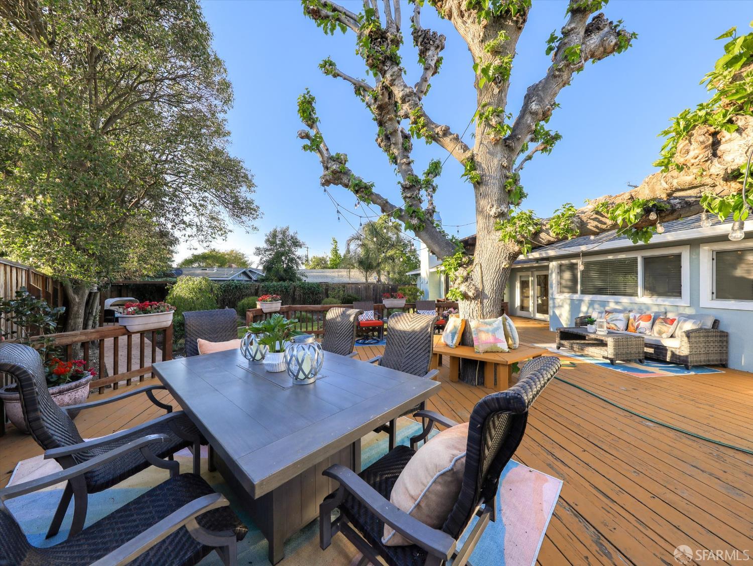 1773 Pinetree Court Concord, CA 94521 - Photo 28 of 37 a view of a patio with a dining table and chairs with a fire pit