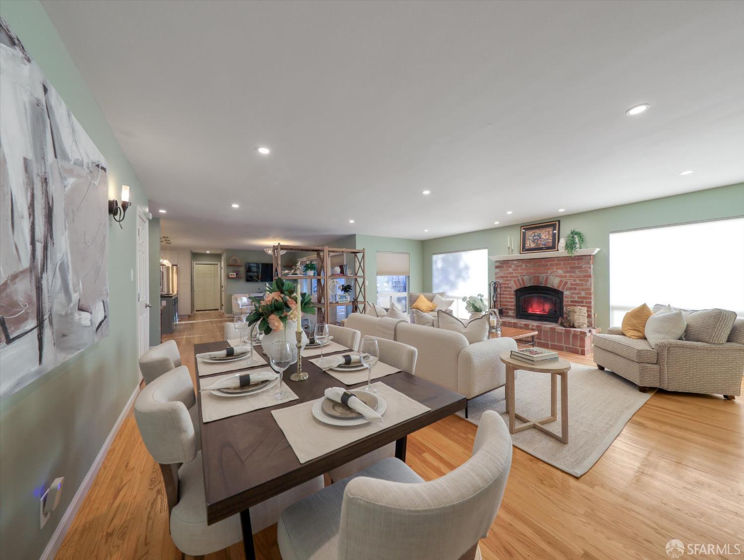 1773 Pinetree Court Concord, CA 94521 - Photo 8 of 37 a living room with furniture and a fireplace