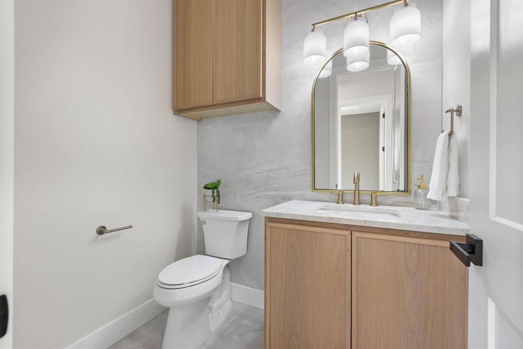 6505 County Road 1126B Godley, TX 76044 - Photo 32 of 39 Bathroom featuring vanity and light tile patternedfloors
