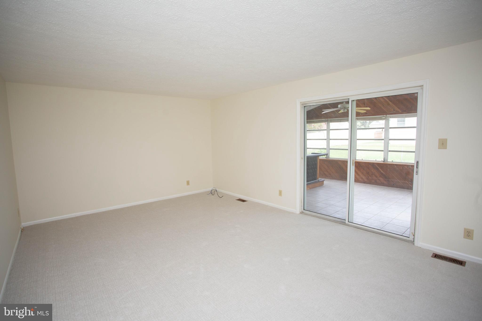 143 Rambling Road Lumberton, NJ 08048 - Photo 17 of 54 an empty room with a fireplace