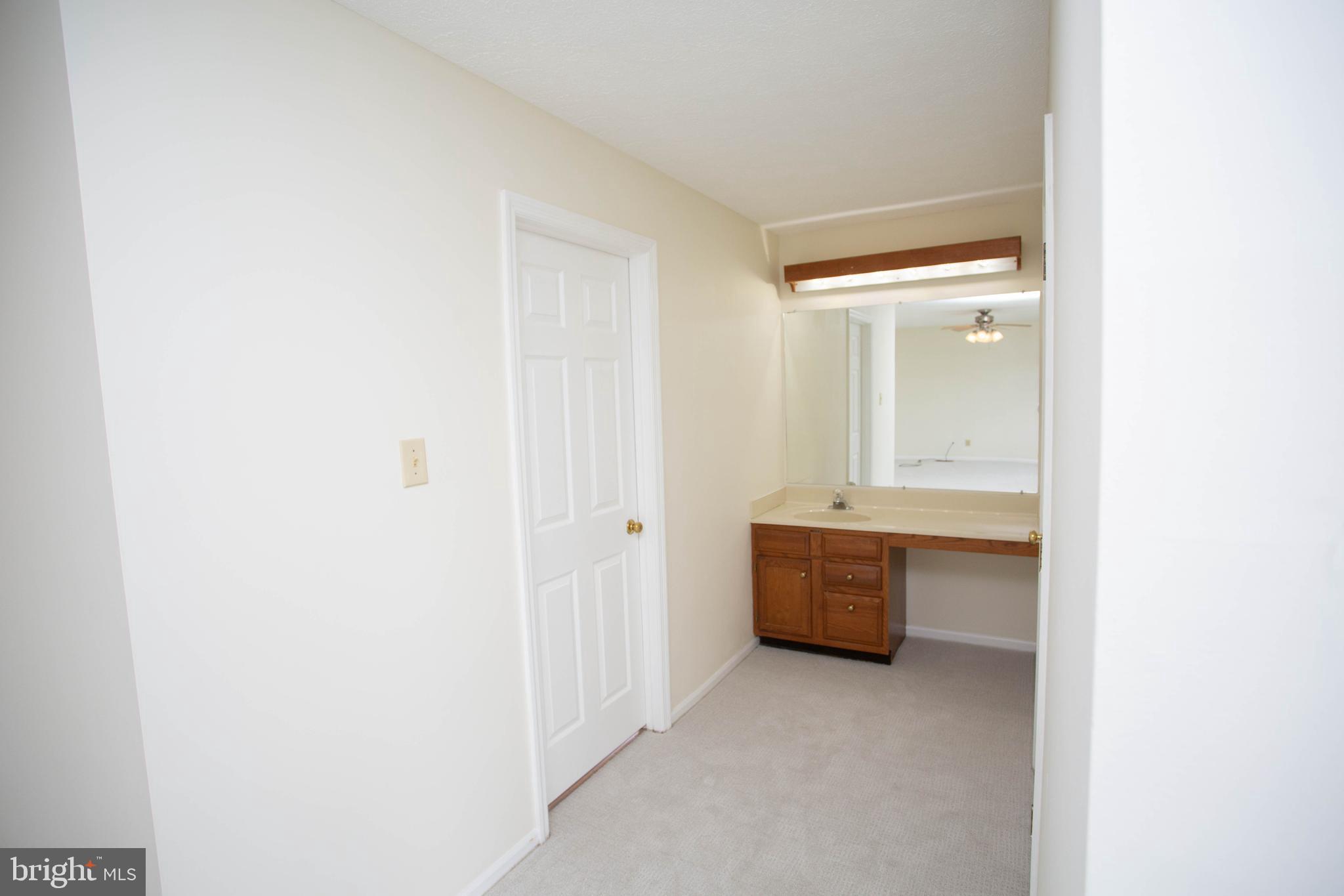 143 Rambling Road Lumberton, NJ 08048 - Photo 24 of 54 a bathroom with a sink and a mirror