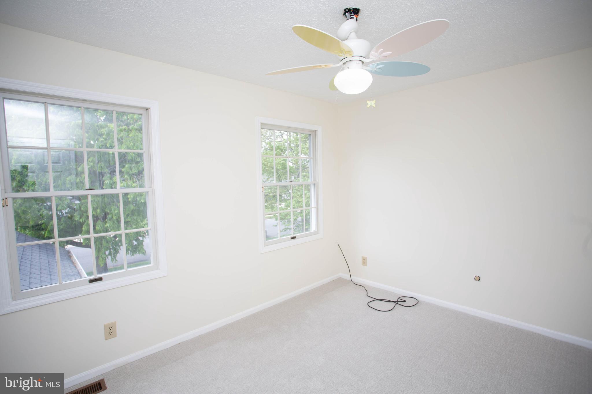 143 Rambling Road Lumberton, NJ 08048 - Photo 28 of 54 an empty room with windows and fan