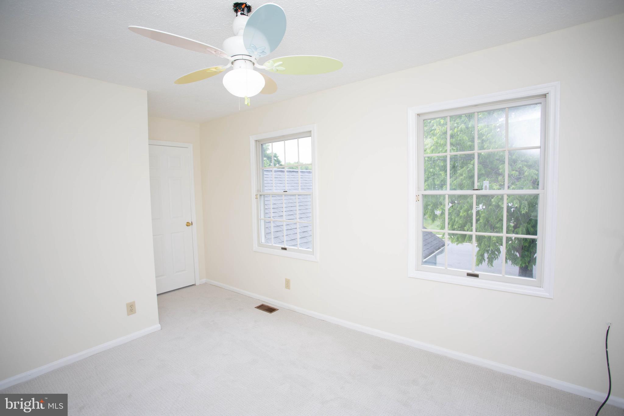 143 Rambling Road Lumberton, NJ 08048 - Photo 29 of 54 an empty room with windows and fan