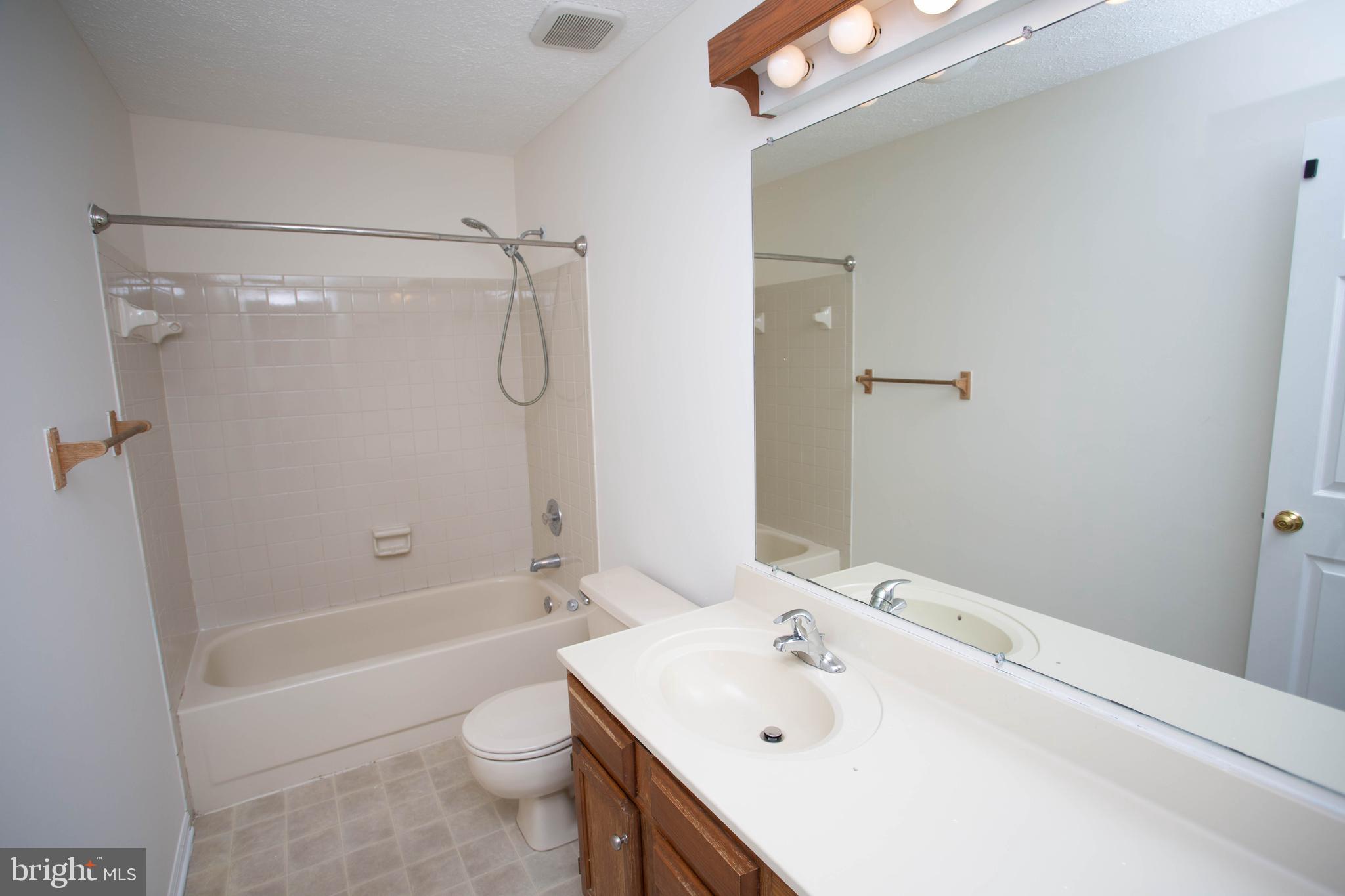 143 Rambling Road Lumberton, NJ 08048 - Photo 34 of 54 a bathroom with a sink a toilet and shower
