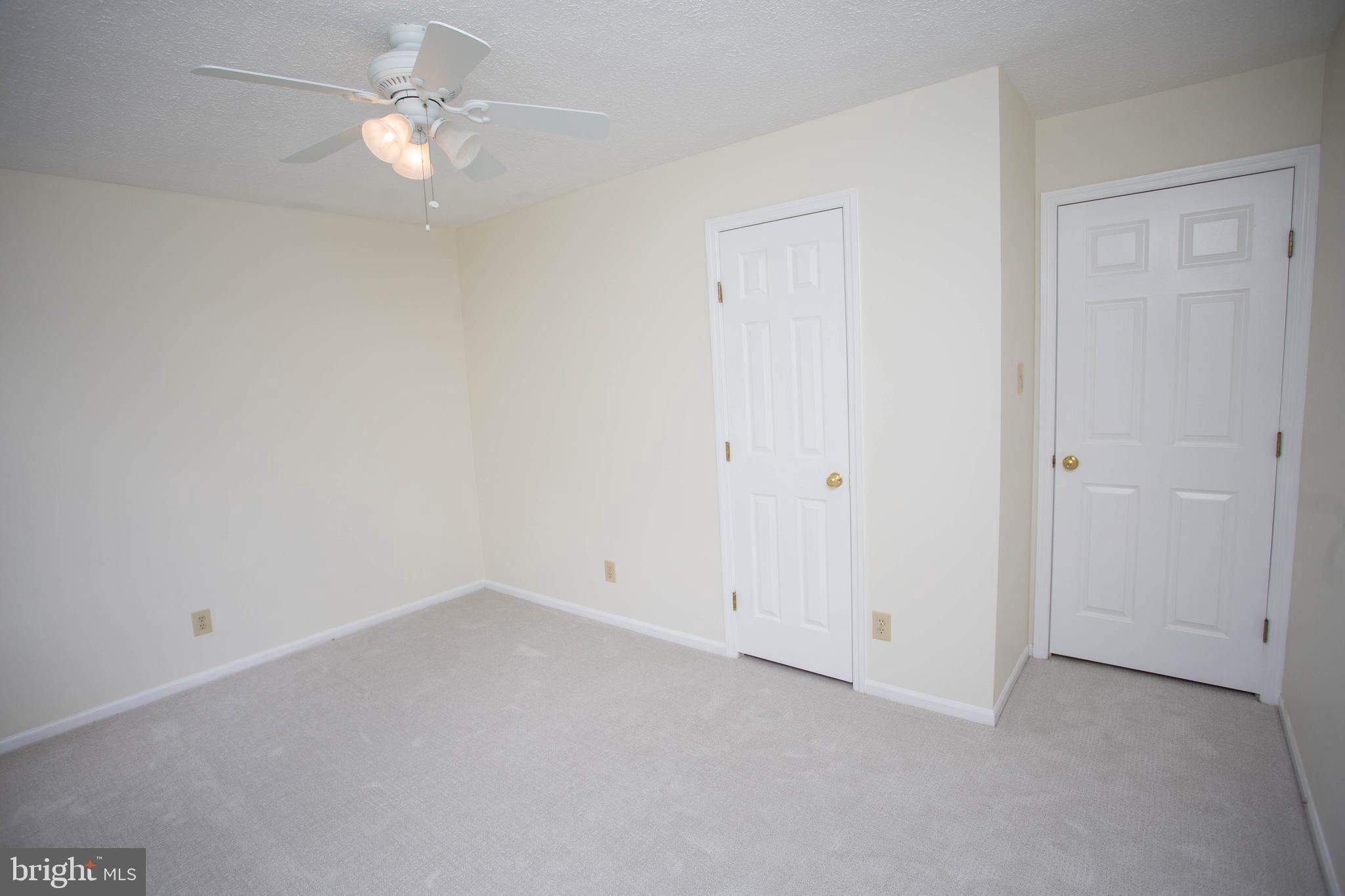 143 Rambling Road Lumberton, NJ 08048 - Photo 37 of 54 an empty room with a chandelier fan