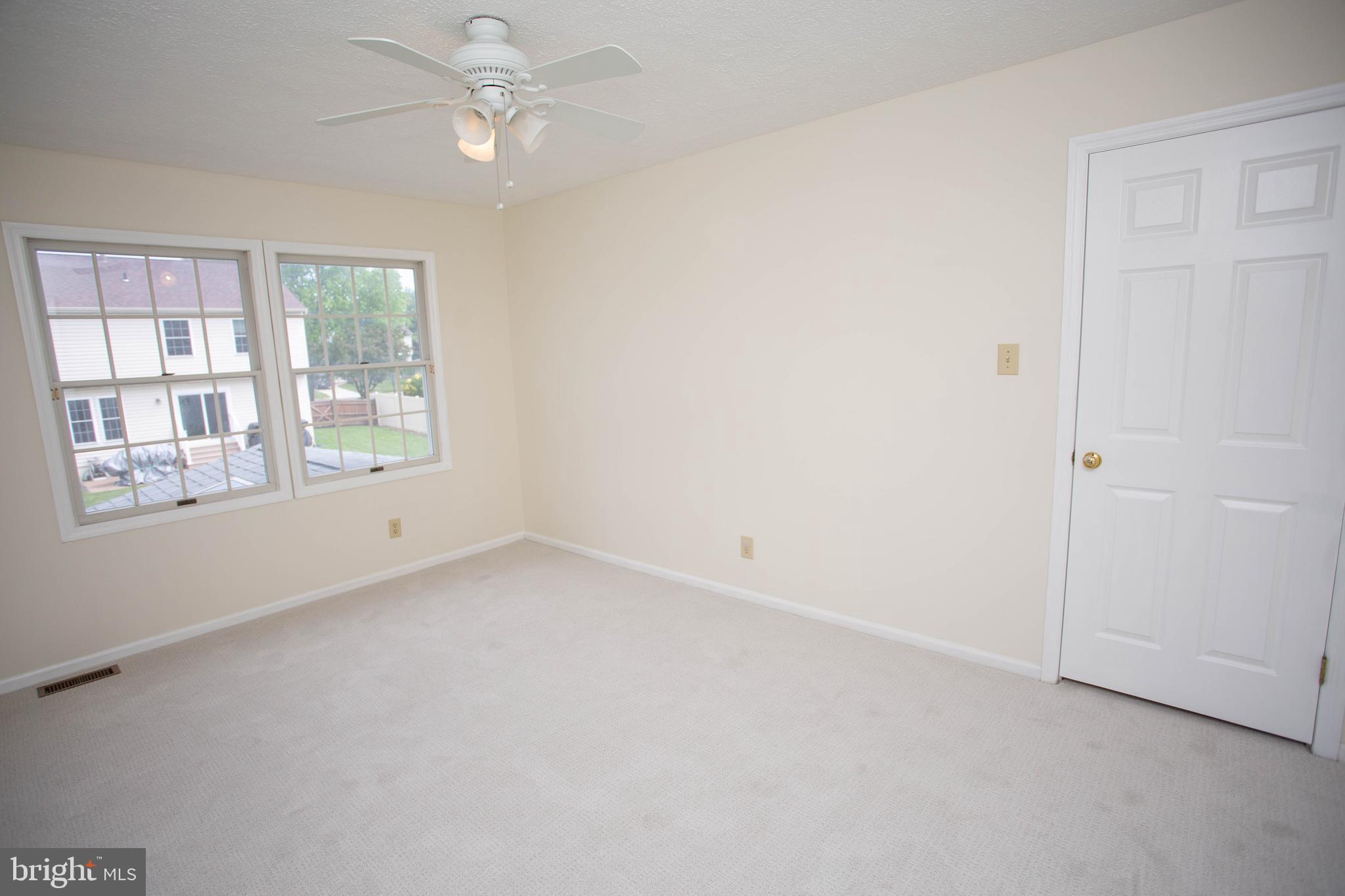 143 Rambling Road Lumberton, NJ 08048 - Photo 38 of 54 an empty room with windows and fan
