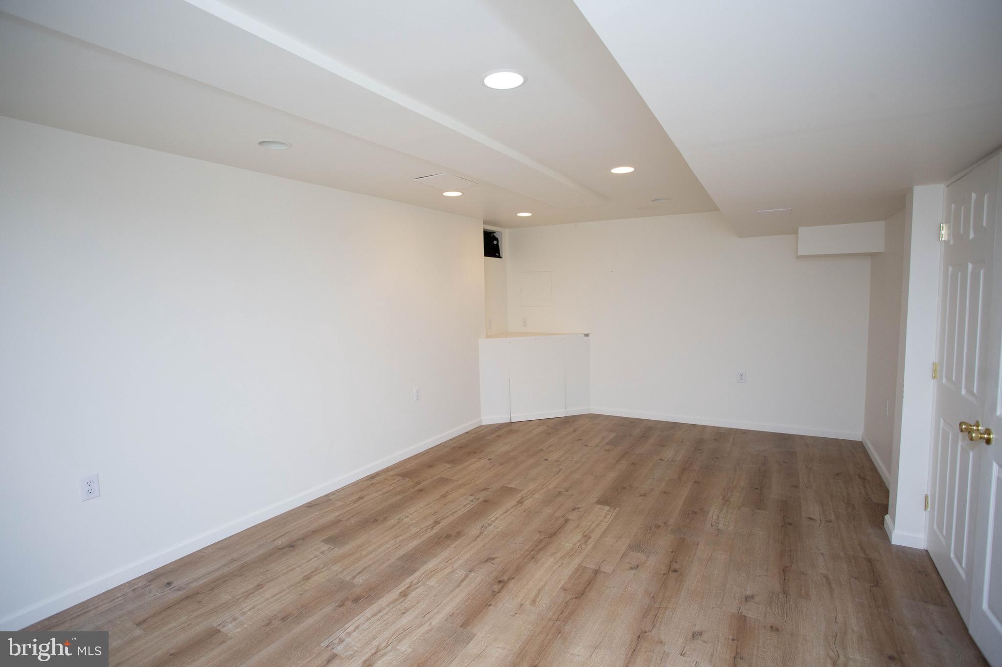 143 Rambling Road Lumberton, NJ 08048 - Photo 43 of 54 a view of empty room with wooden floor