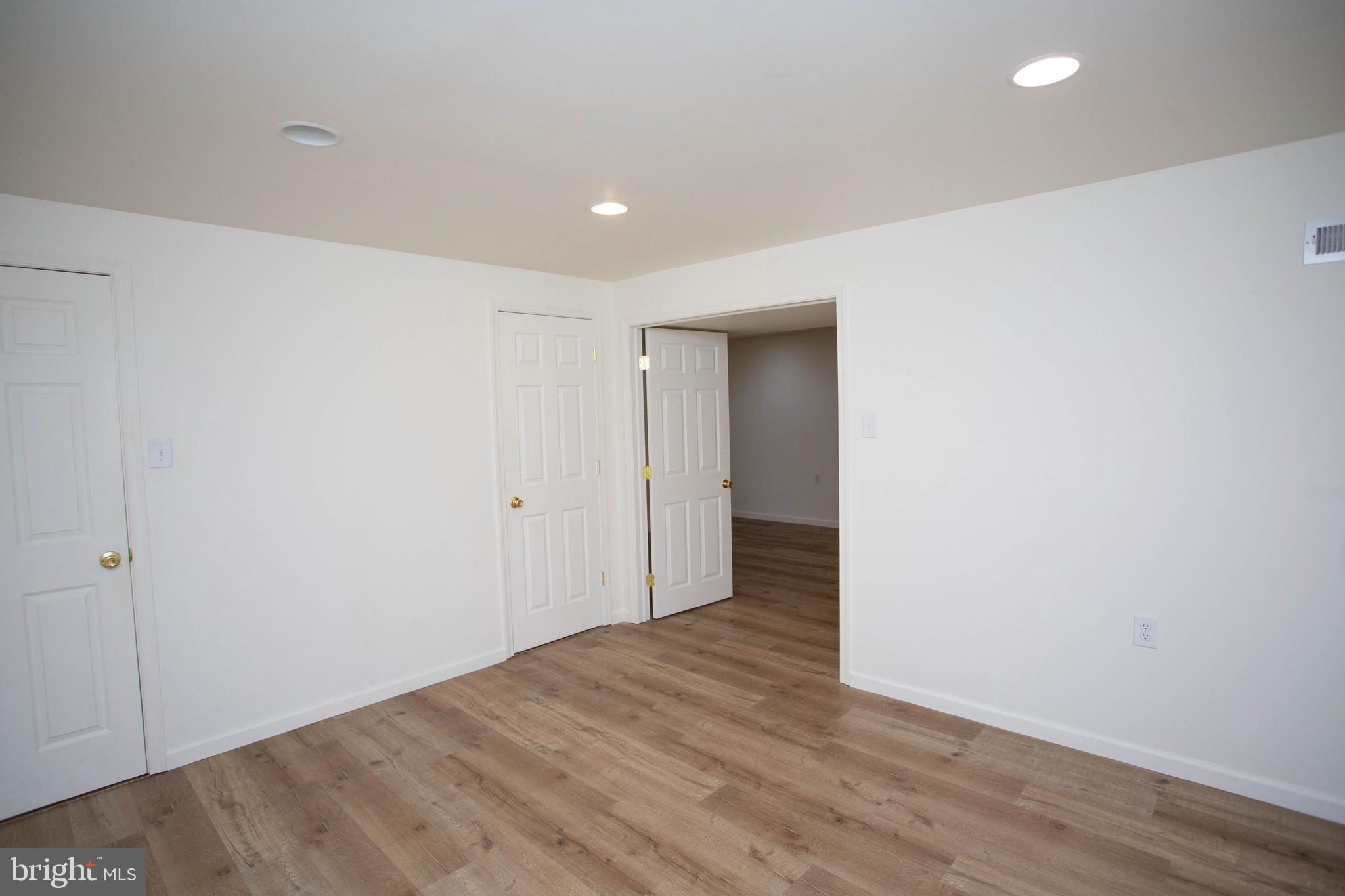 143 Rambling Road Lumberton, NJ 08048 - Photo 46 of 54 a view of hallway with wooden floor