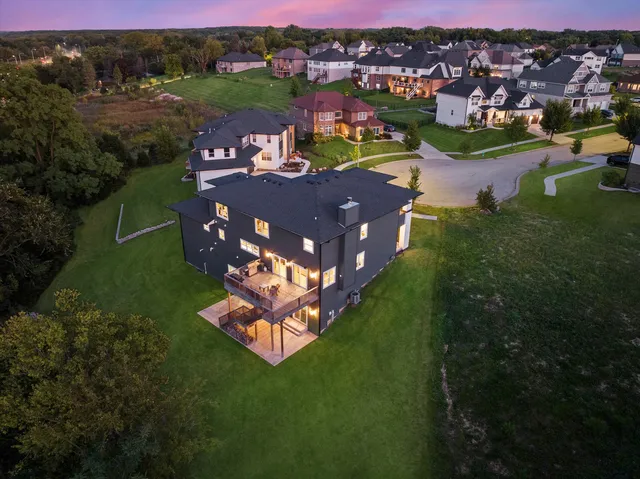 a view of a house with a swimming pool