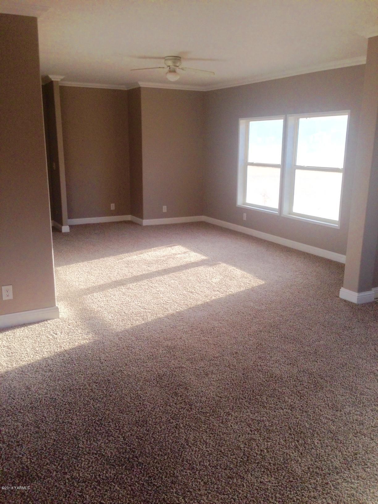 100 Ranger Road Naches, WA 98937 - Photo 3 of 10 an empty room with windows