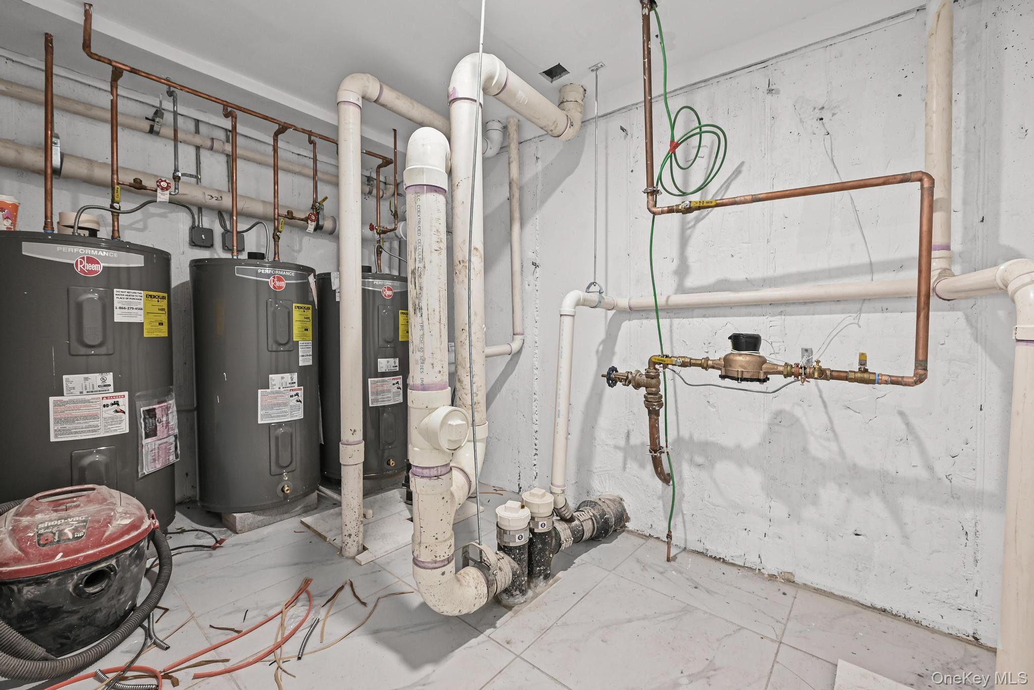 160-15 118th Road Queens, NY 11434 - Photo 19 of 23 a bathroom with a granite countertop sink a toilet and a shower