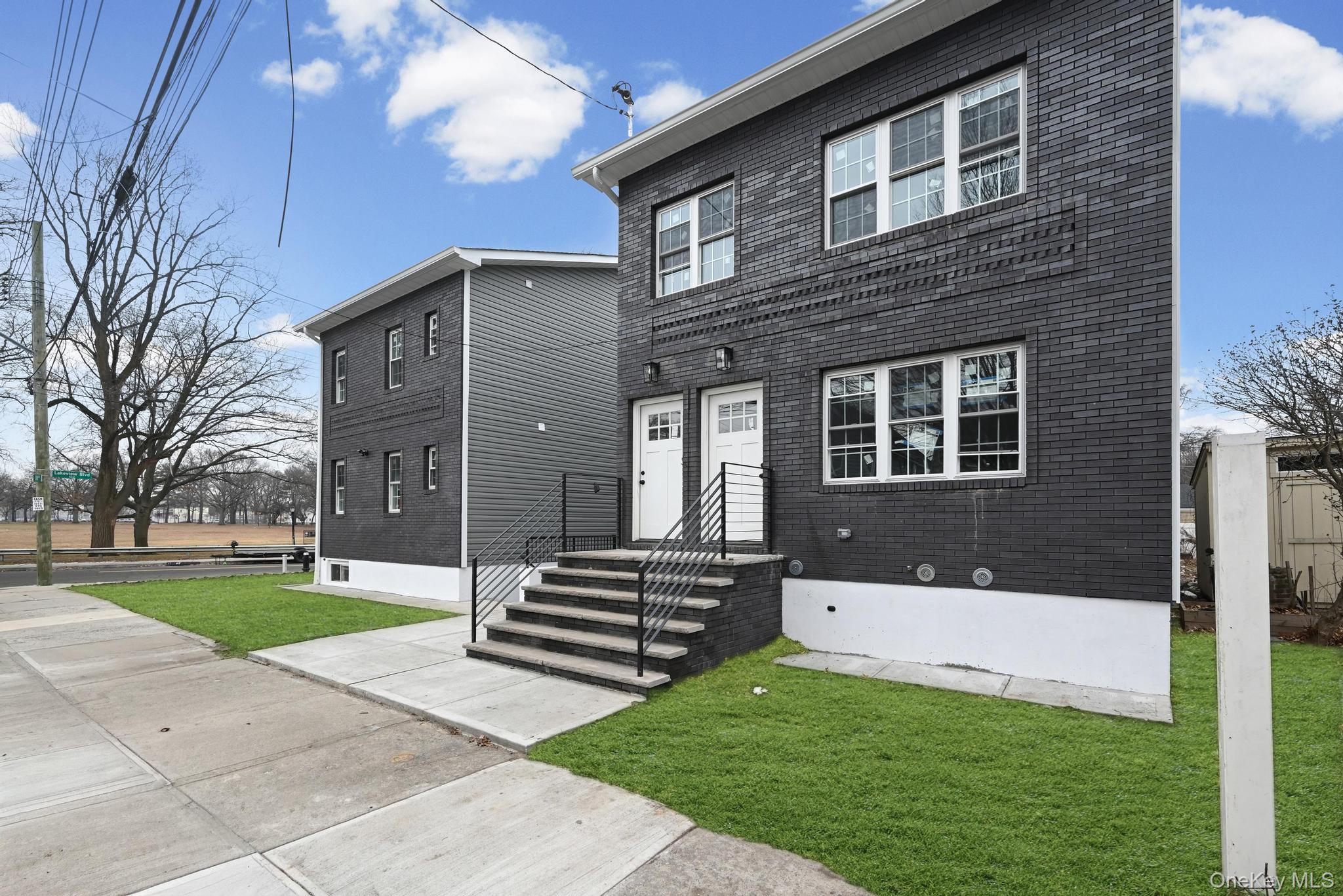 160-15 118th Road Queens, NY 11434 - Photo 3 of 23 a view of backyard with a garden and trees