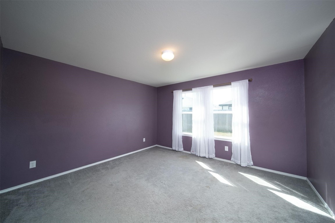 24023 Swather Way Hockley, TX 77447 - Photo 15 of 26 an empty room with windows