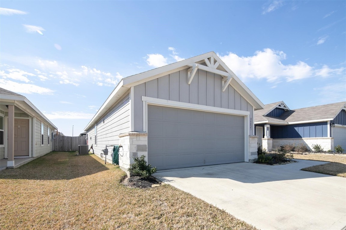 24023 Swather Way Hockley, TX 77447 - Photo 2 of 26 a view of a house with a outdoor space