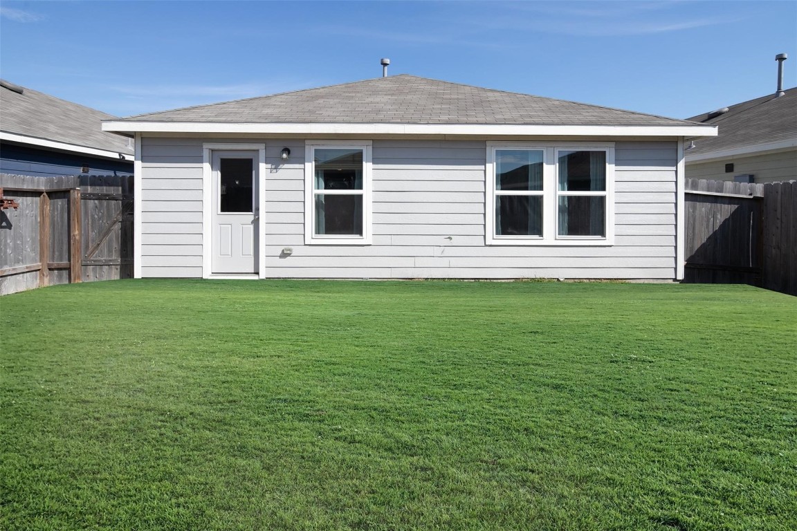24023 Swather Way Hockley, TX 77447 - Photo 4 of 26 a front view of a house with a yard