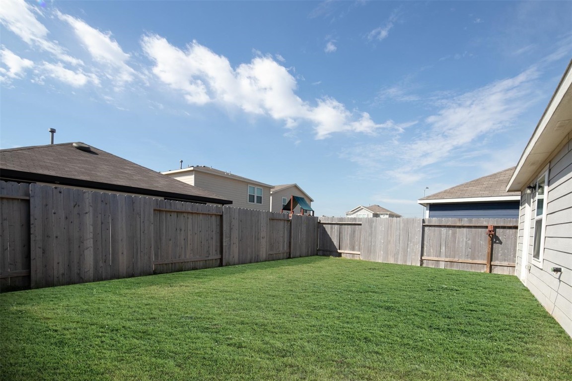 24023 Swather Way Hockley, TX 77447 - Photo 5 of 26 a view of a backyard with pathway
