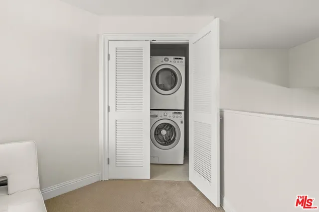 a view of washer and dryer in a utility room