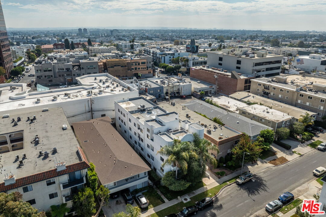 11822 Goshen Avenue, Unit 301 Los Angeles, CA 90049 - Photo 27 of 29 an aerial view of a residential building with parking space