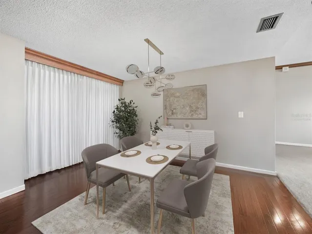 a kitchen with stainless steel appliances granite countertop a stove and a microwave