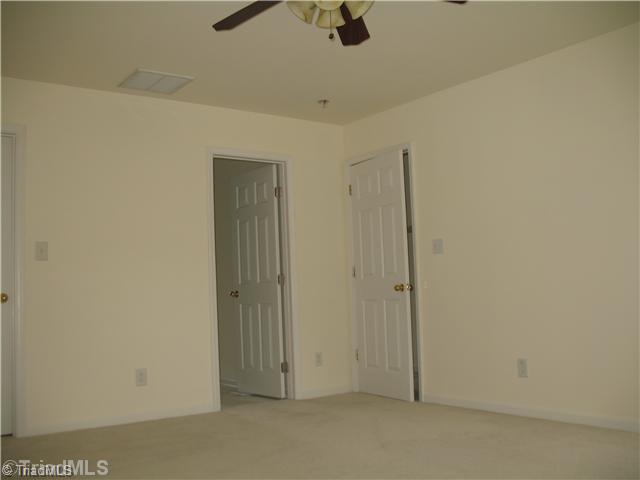 6105 Buckhorn Road Greensboro, NC 27410 - Photo 6 of 16 Master Bedroom. Master En Suite large walk in closet and master bath with double vanity