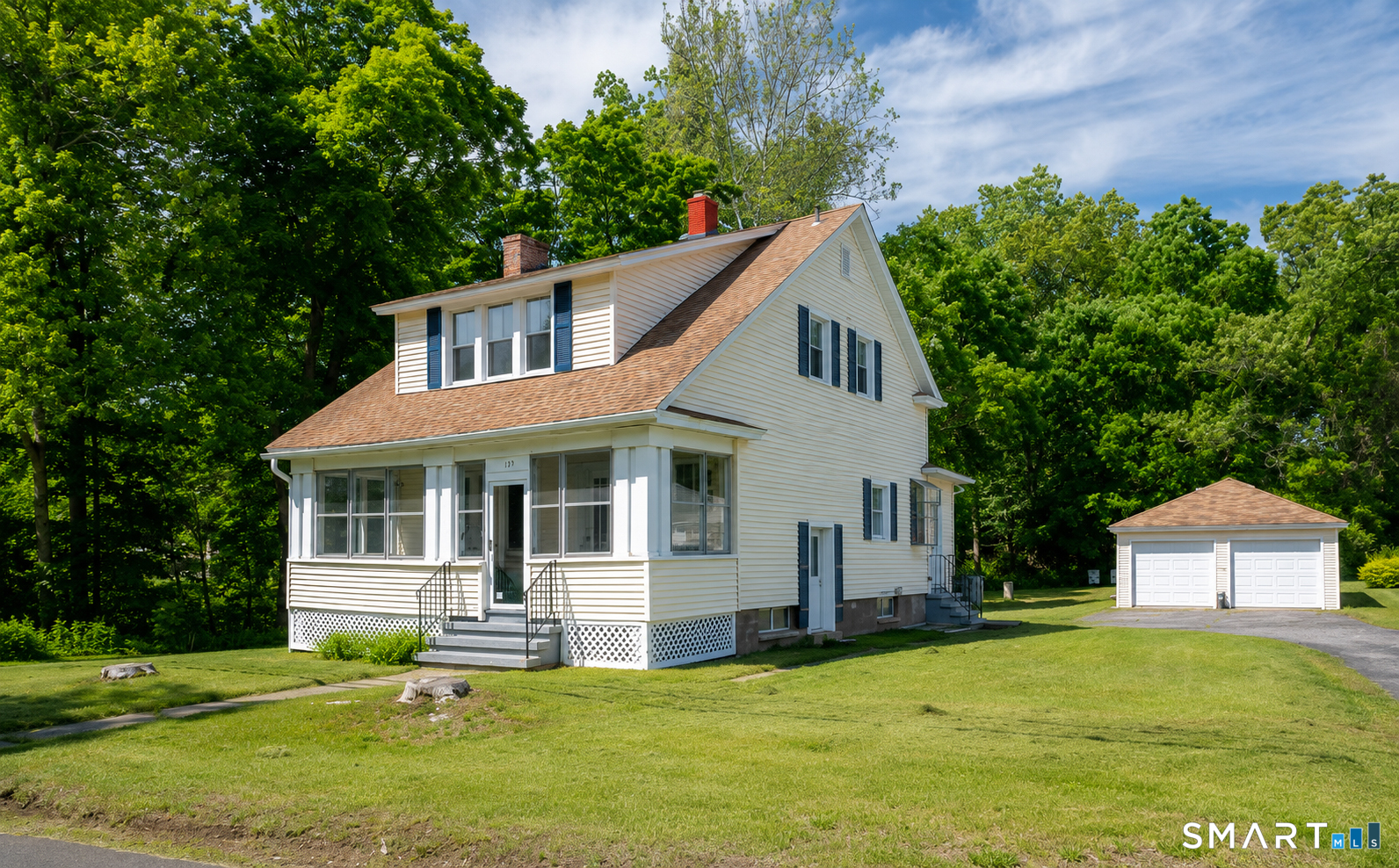 120 May Street Naugatuck, CT 06770 - Photo 28 of 31 a view of a house with a yard potted plants and large tree