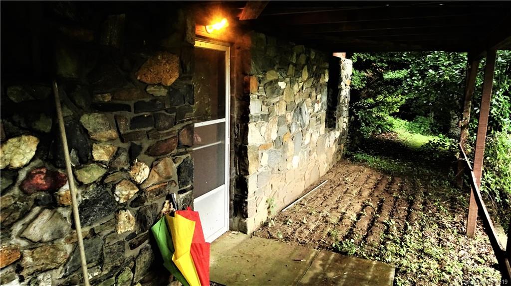 360 Banjo Branch Road Burnsville, NC 28714 - Photo 12 of 17 a close view of water heater room