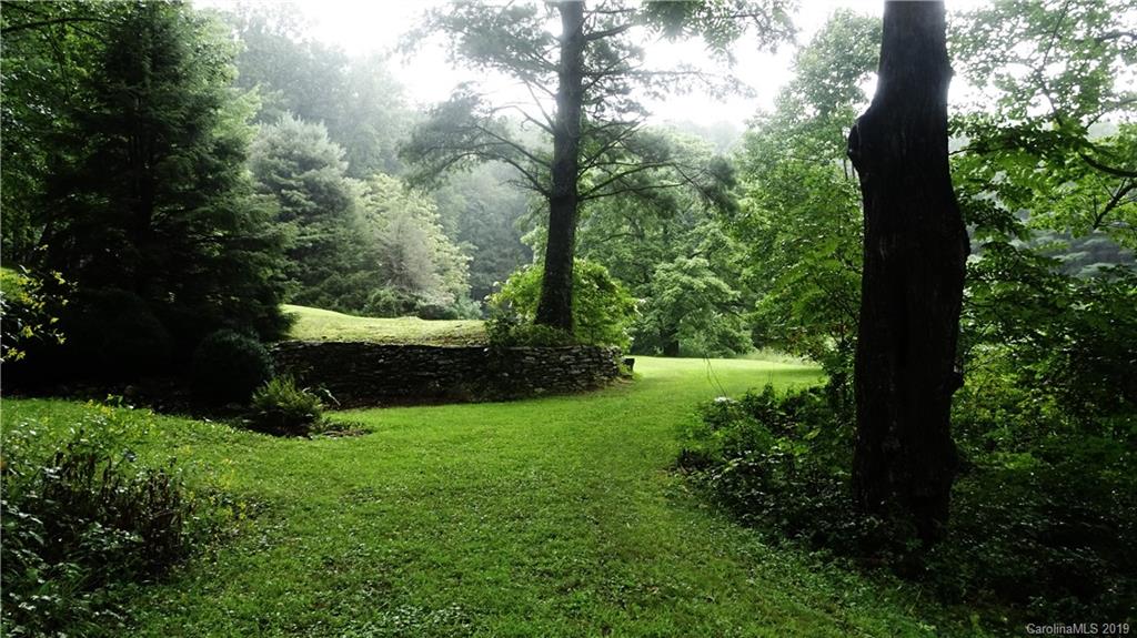 360 Banjo Branch Road Burnsville, NC 28714 - Photo 3 of 17 a view of an outdoor space with a lake view