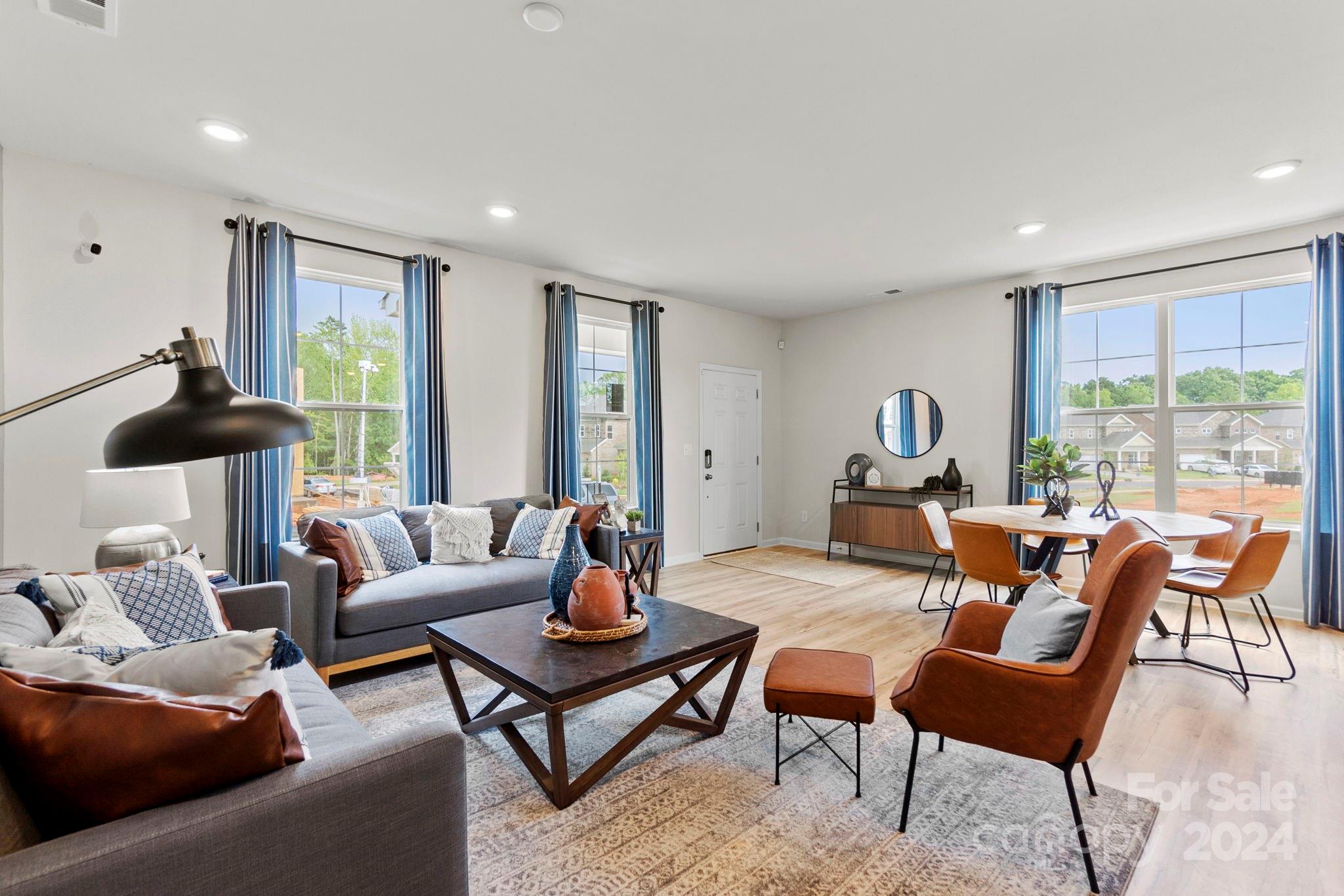 7902 Nelson Road Mint Hill, NC 28227 - Photo 1 of 30 a living room with furniture and a large window