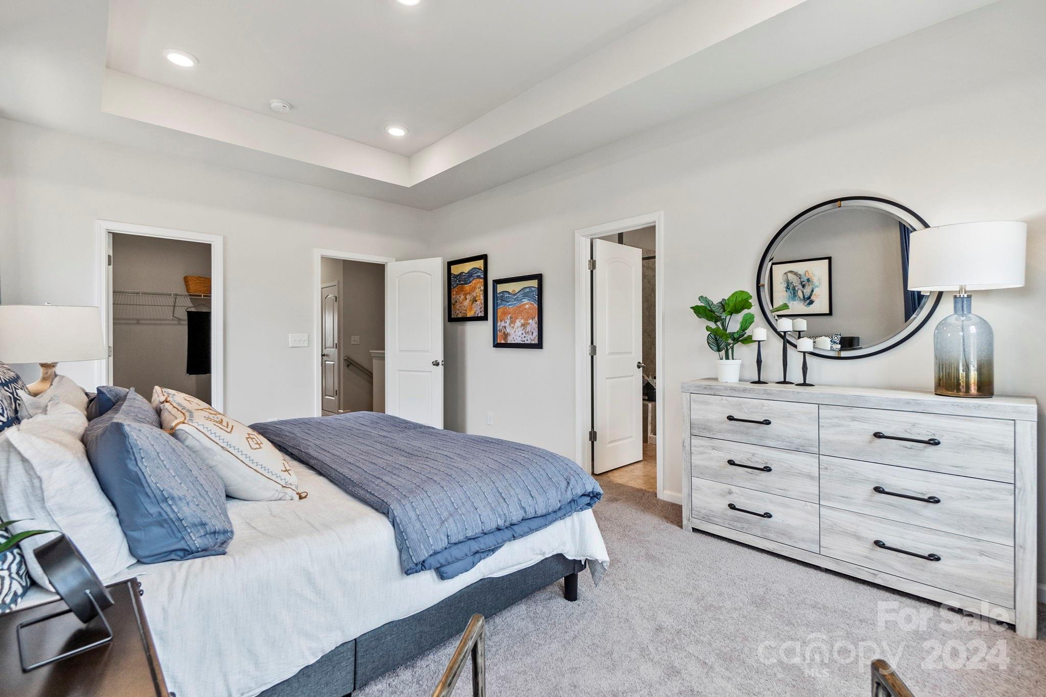 7902 Nelson Road Mint Hill, NC 28227 - Photo 13 of 30 a bedroom with a bed and a dresser