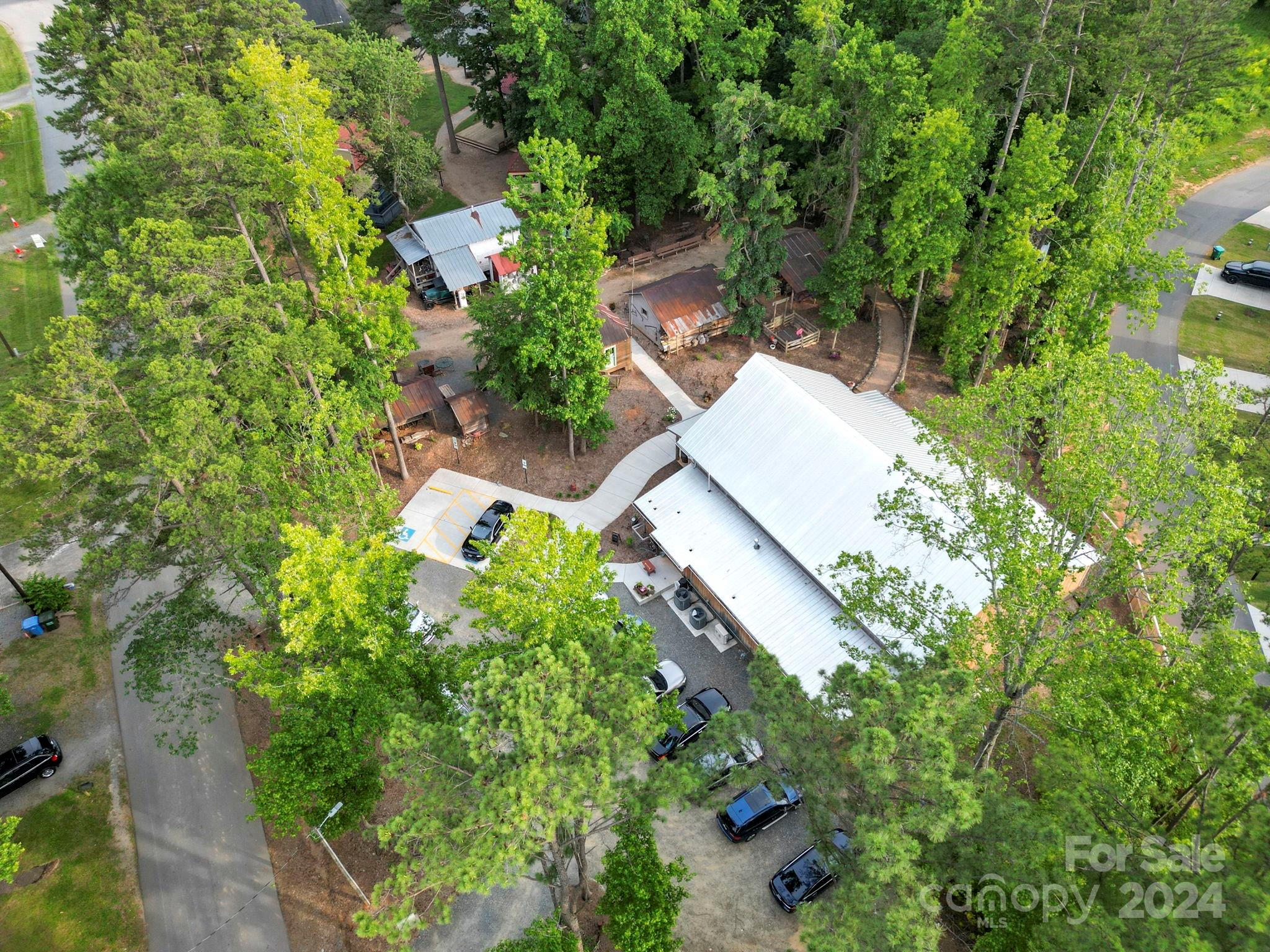 7902 Nelson Road Mint Hill, NC 28227 - Photo 25 of 30 an aerial view of a house with a yard and garden