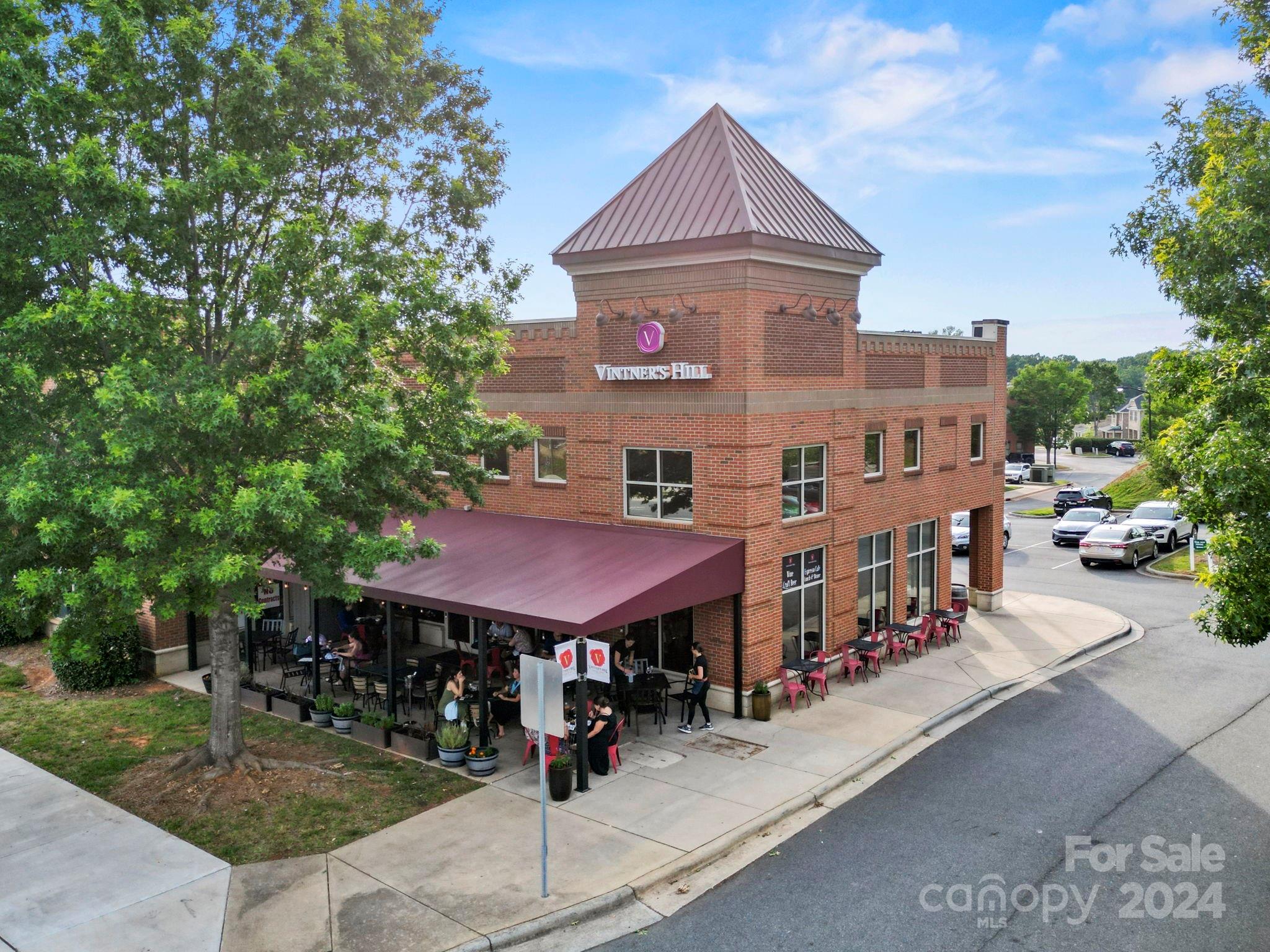 7902 Nelson Road Mint Hill, NC 28227 - Photo 26 of 30 a front view of a building with trees